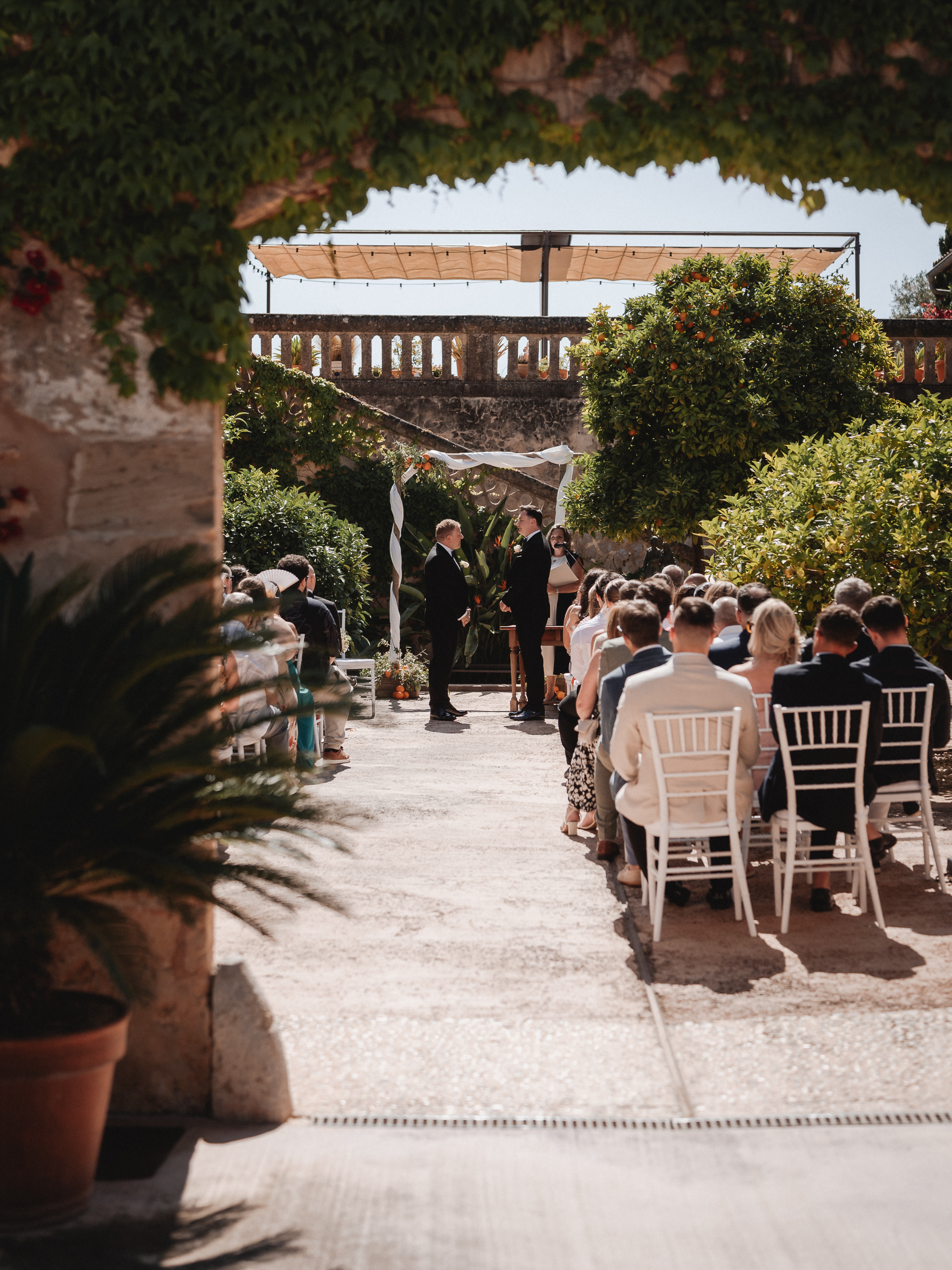 Wedding ceremony viewed from behind guests at Finca Son Mir Mallorca