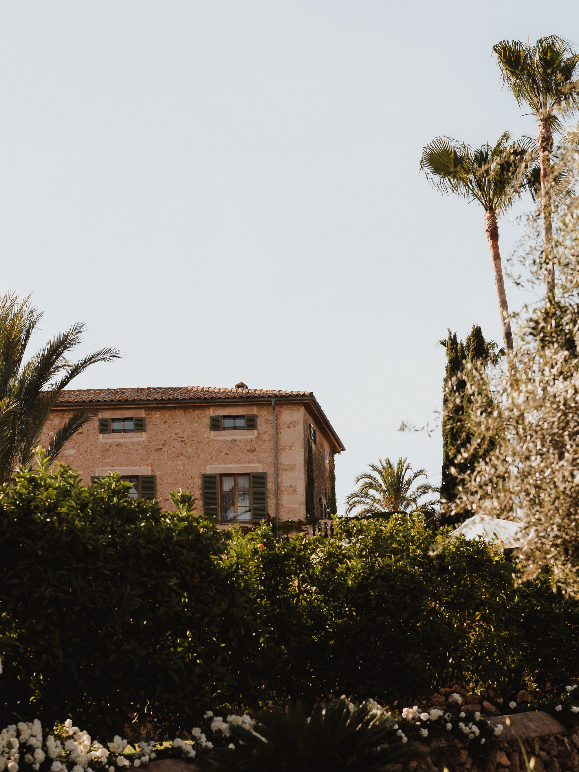 Finca Son Mir wedding venue surrounded by palm trees in Mallorca photographed by Photos by Ville