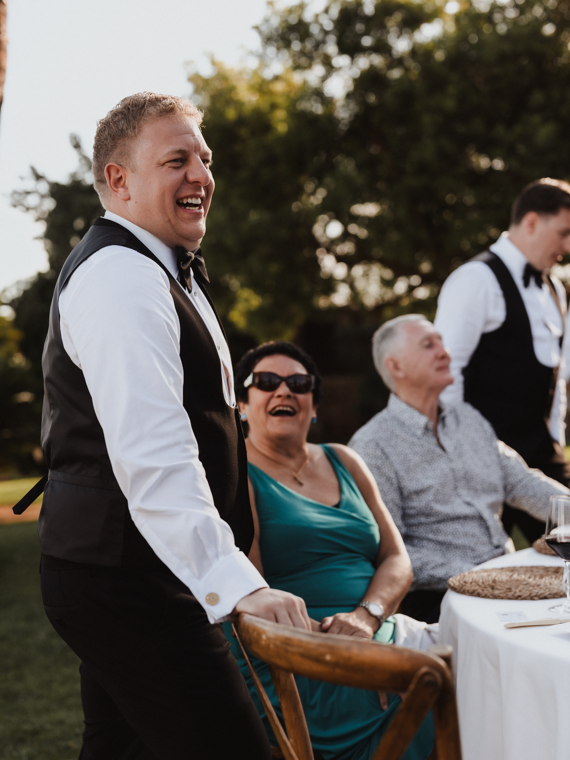 Groom sharing a fun moment with guests during wedding at Finca Son Mir Mallorca photographed by Photos by Ville