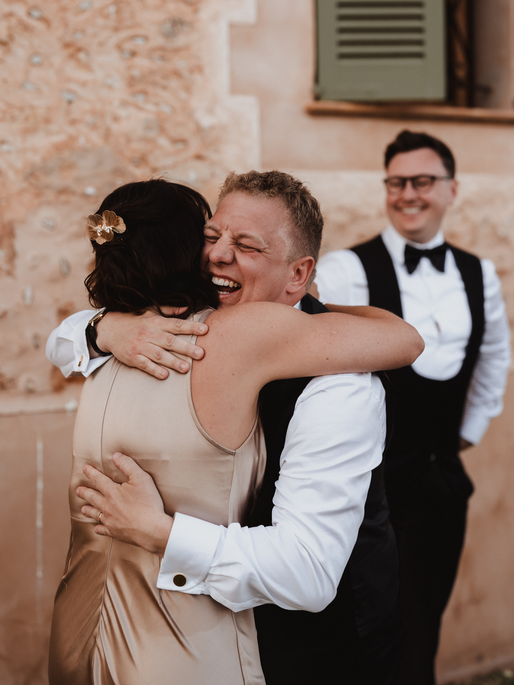 Groom hugging his sister after speech at Finca Son Mir Mallorca photographed by Photos by Ville