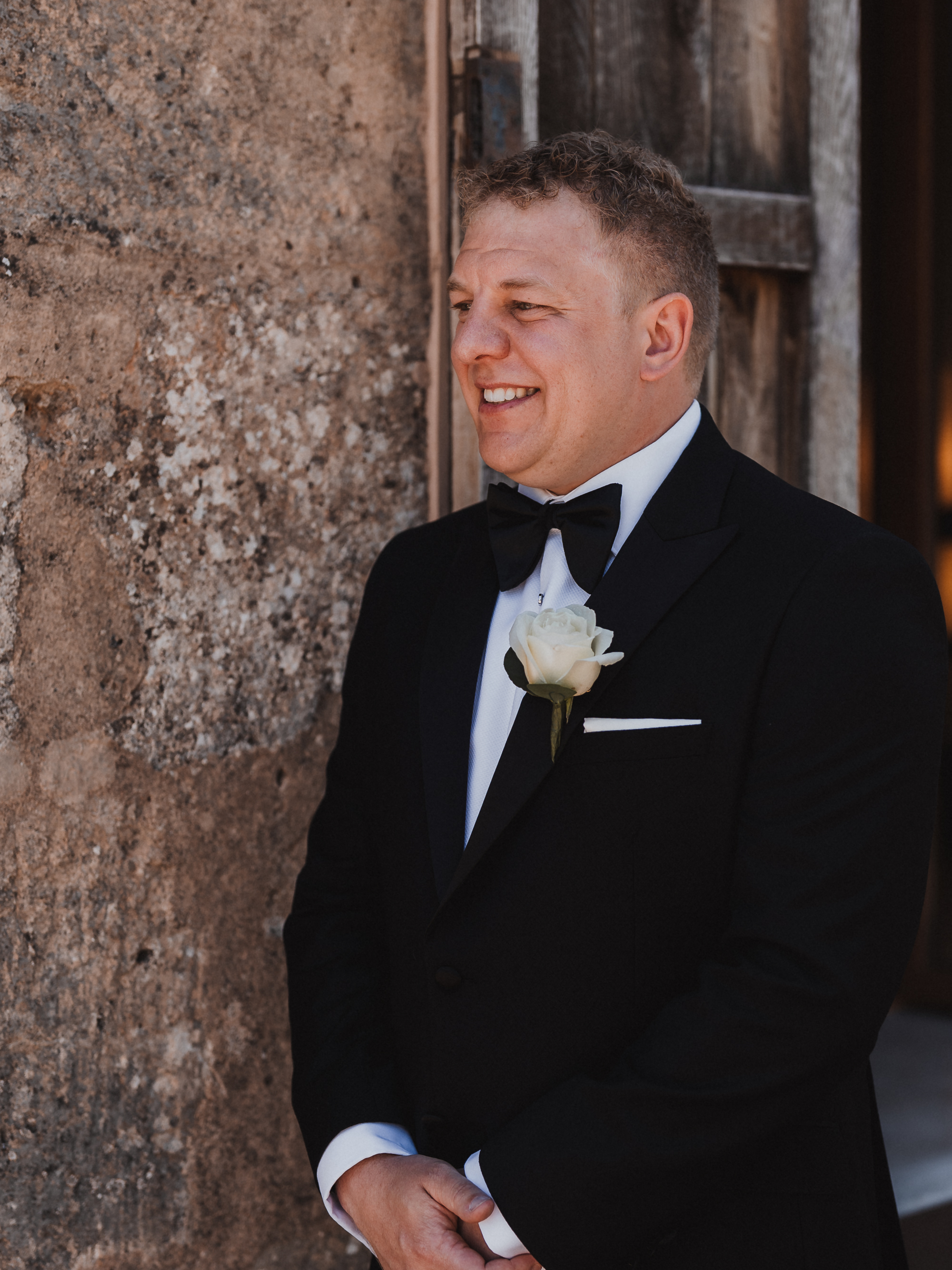 Groom waiting nervously for the first look at Finca Son Mir Mallorca captured by Photos by Ville