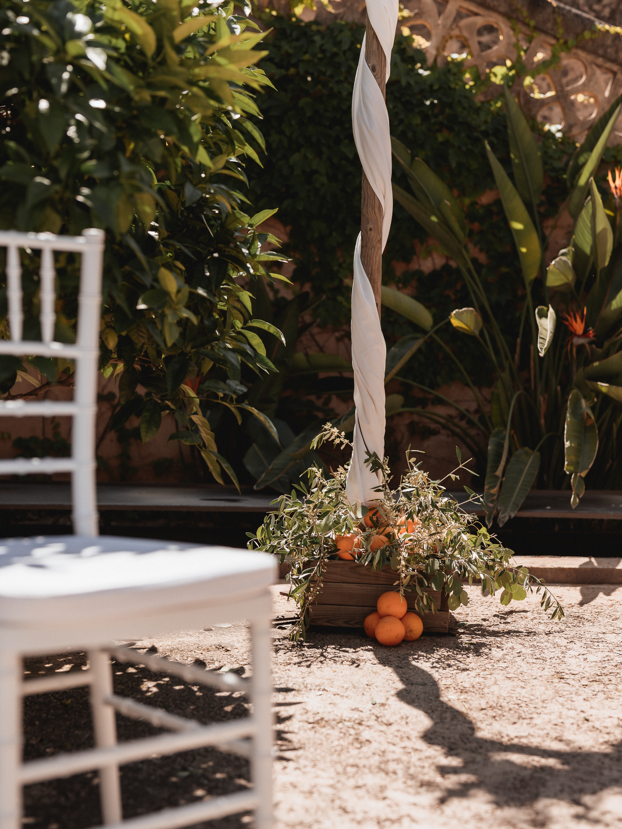 Decorative oranges displayed at a wedding ceremony setup at Finca Son Mir Mallorca