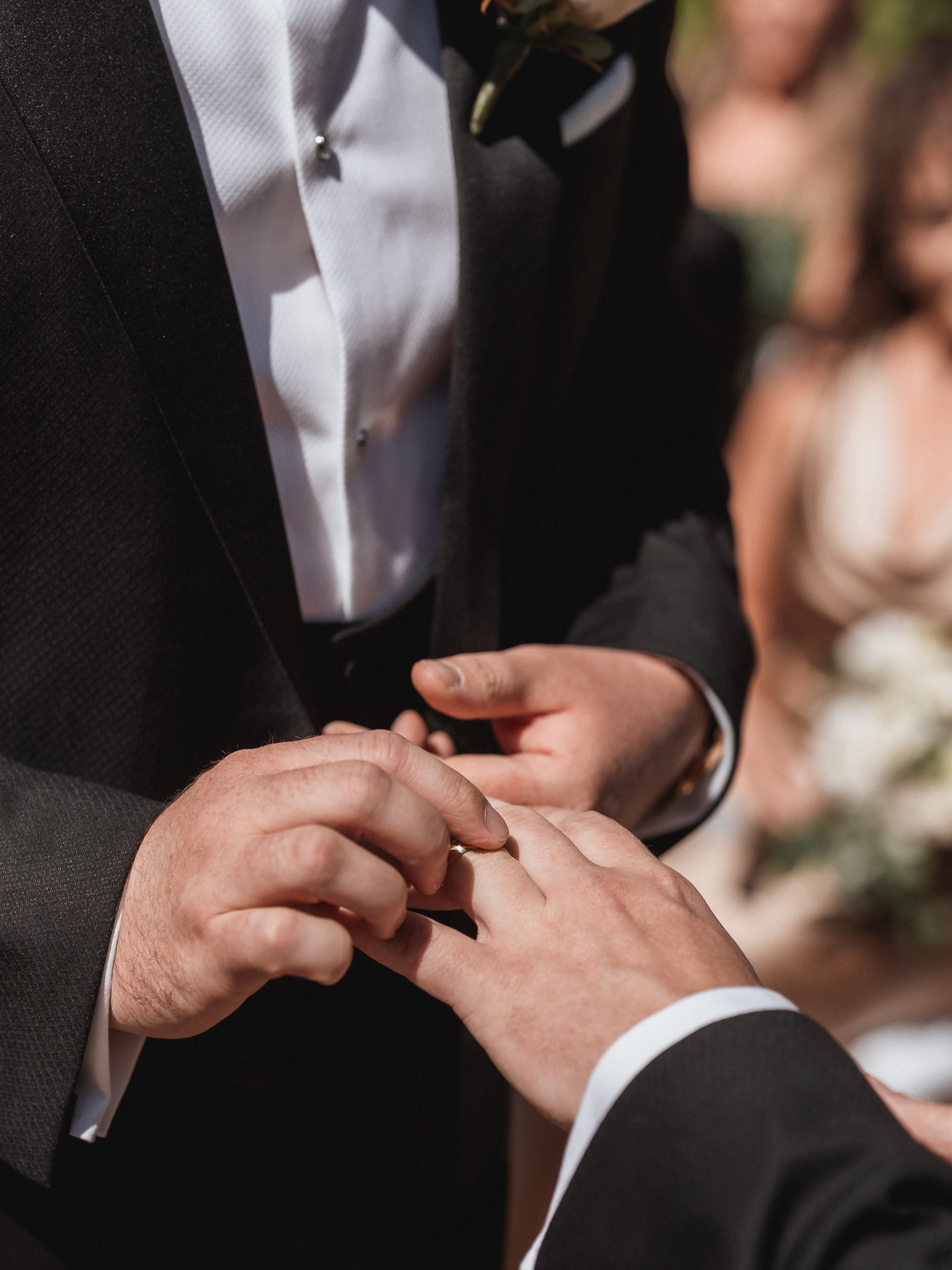 Ring exchange between two grooms during ceremony at Finca Son Mir Mallorca captured by Photos by Ville