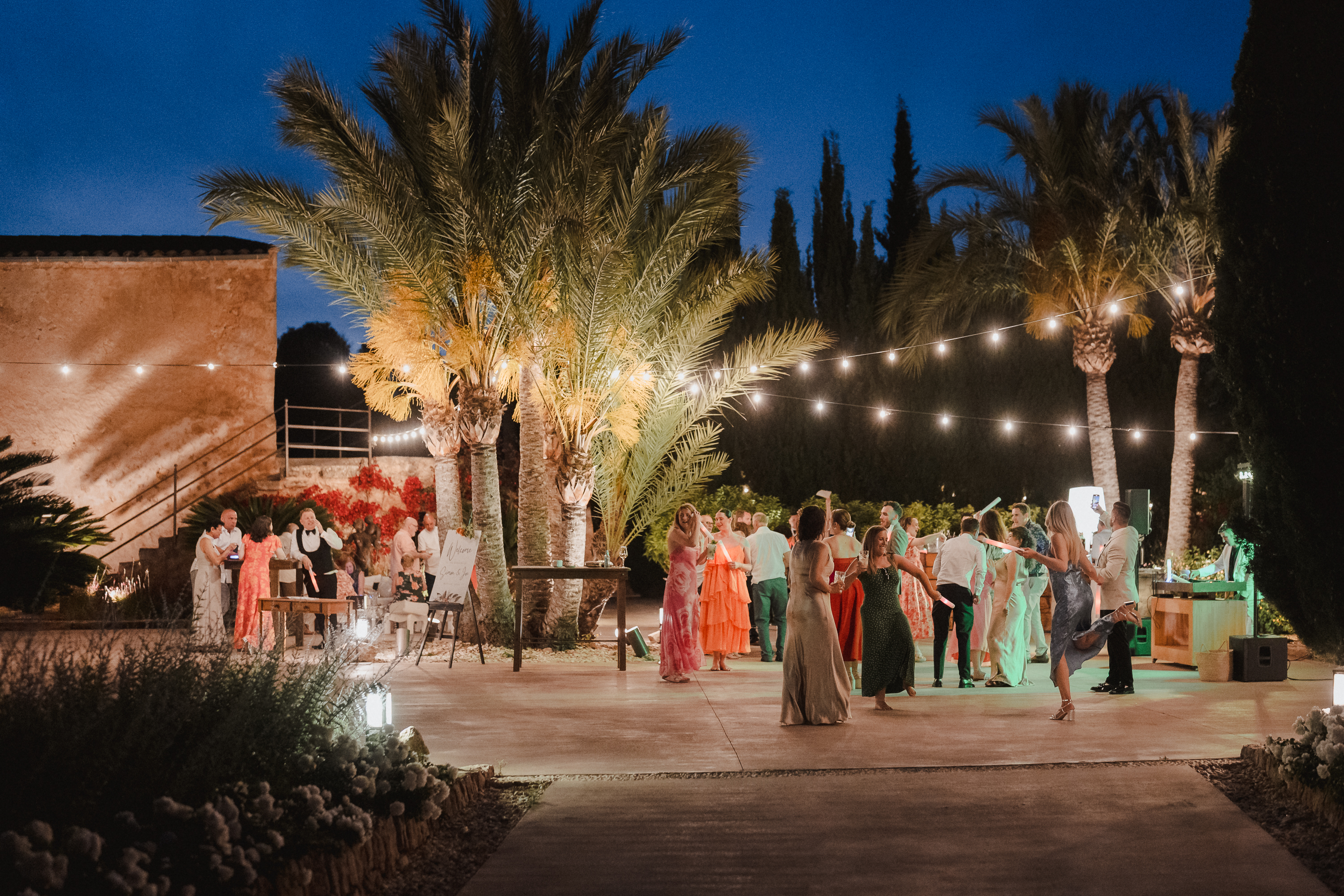 Evening wedding party at Finca Son Mir Mallorca with guests dancing photographed by Photos by Ville