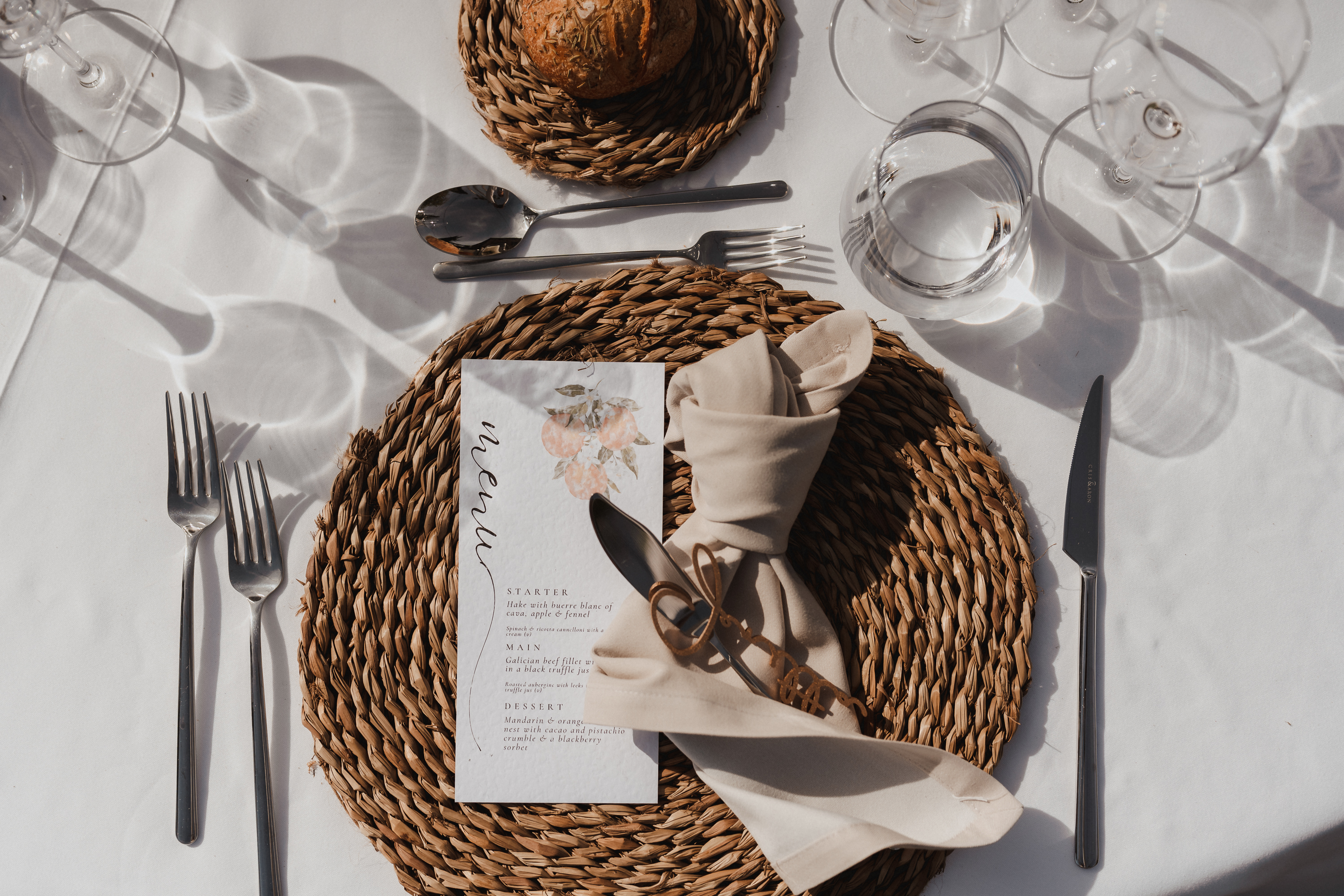 Close-up of wedding table details with glasses and cutlery at Finca Son Mir Mallorca